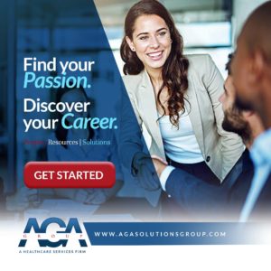 image of young woman standing at the table of other young professionals networking discussing how company downsizing has impacted her