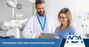 Man and woman dental professionals standing in the operatory networking